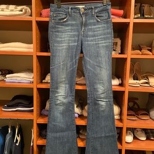 DL1961 medium-dark wash flare jeans.